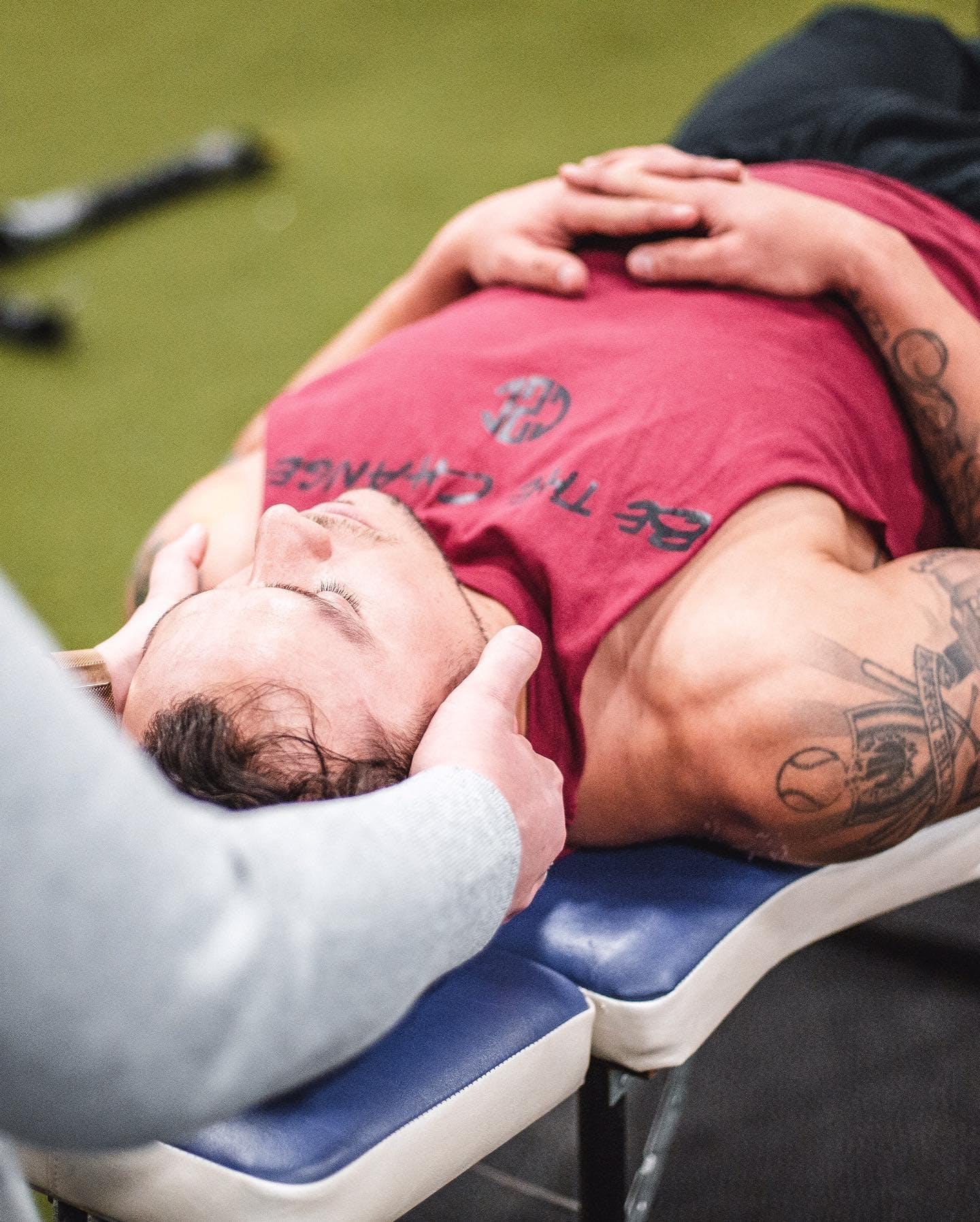 Athlete receiving chiropractic care from Active Faith Chiropractic